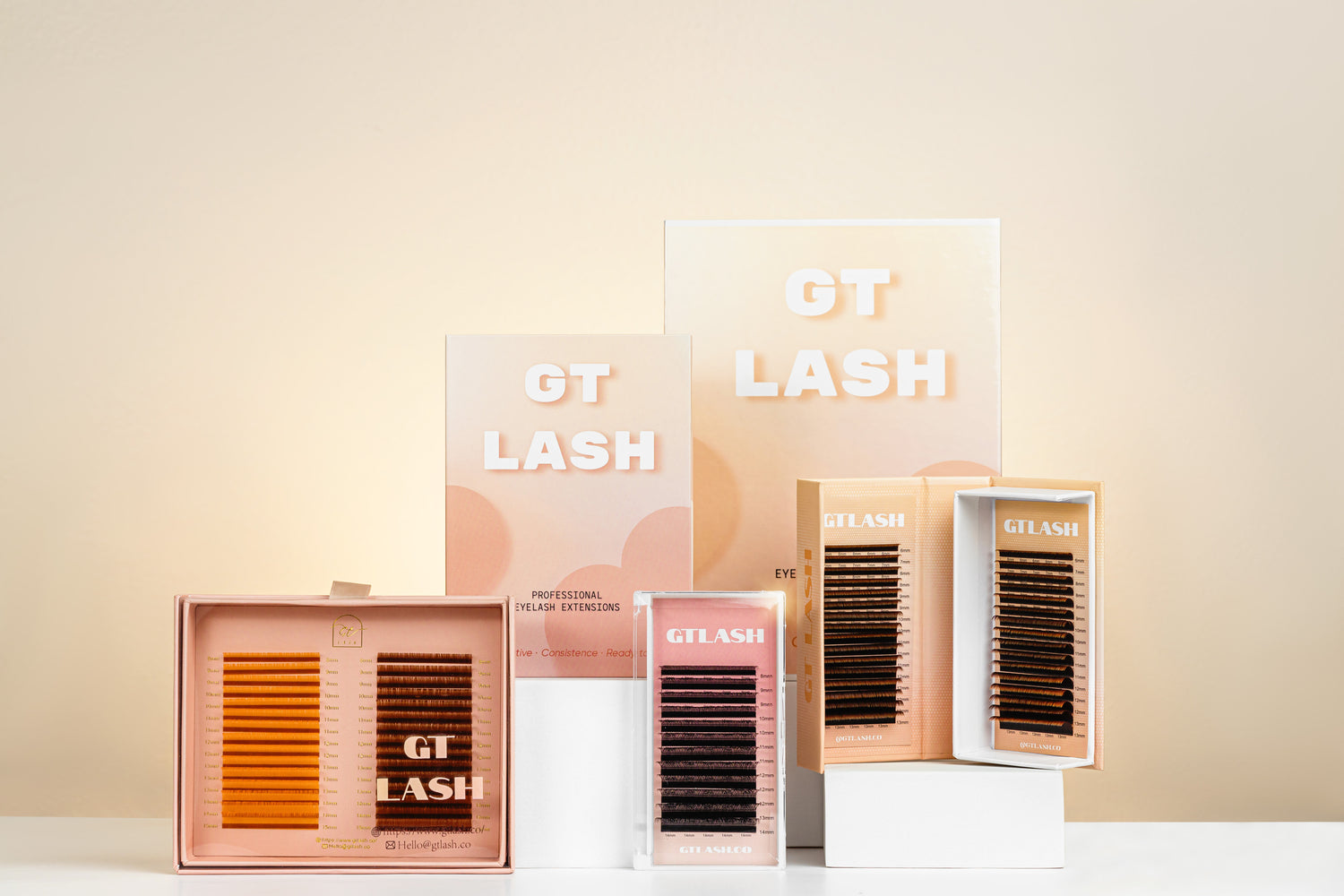 GT Lash Co. Best Sellers — professional eyelash extension trays, premade fans, and lash supplies displayed in premium packaging.