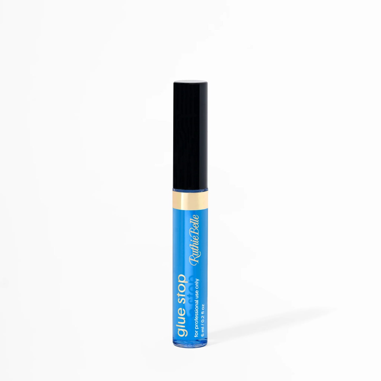 A bottle of Glue Stop by GT Lash Co, a lash artist's adhesive control solution, with a black cap and blue label.