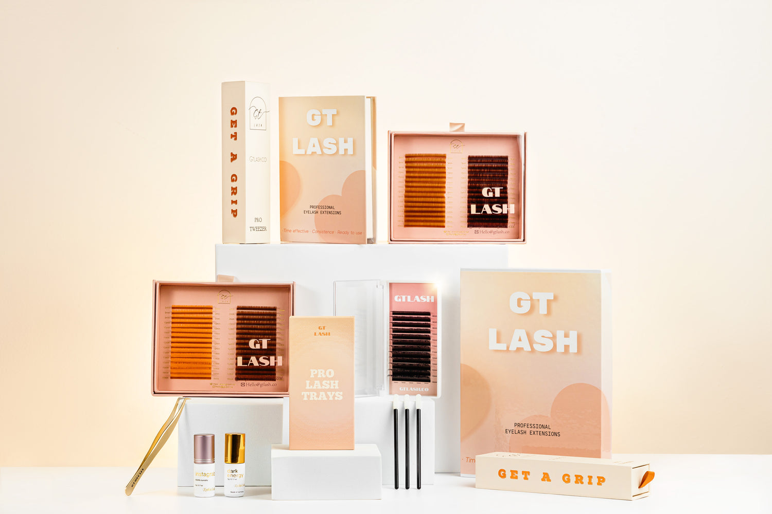 GT Lash Co professional lash supplies including pro lash trays, premade fans, tweezers, and adhesives for eyelash extensions