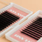 GT Lash Co YY Lash Extensions — split-tip YY premade fibers in a pink lash tray for textured classic lash sets and high-retention application.